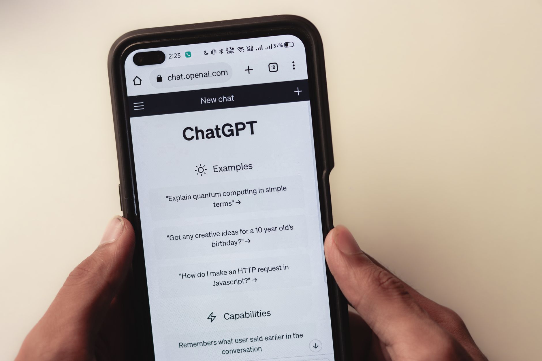 Person using ChatGPT on a laptop to write SEO blog post prompts