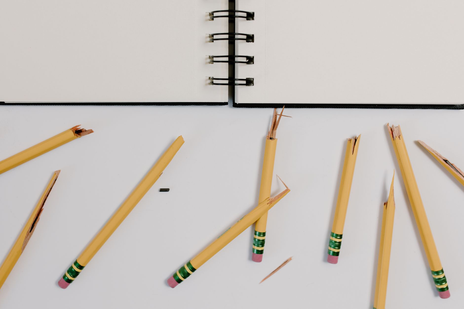 Person typing on a laptop showing an AI writing dashboard